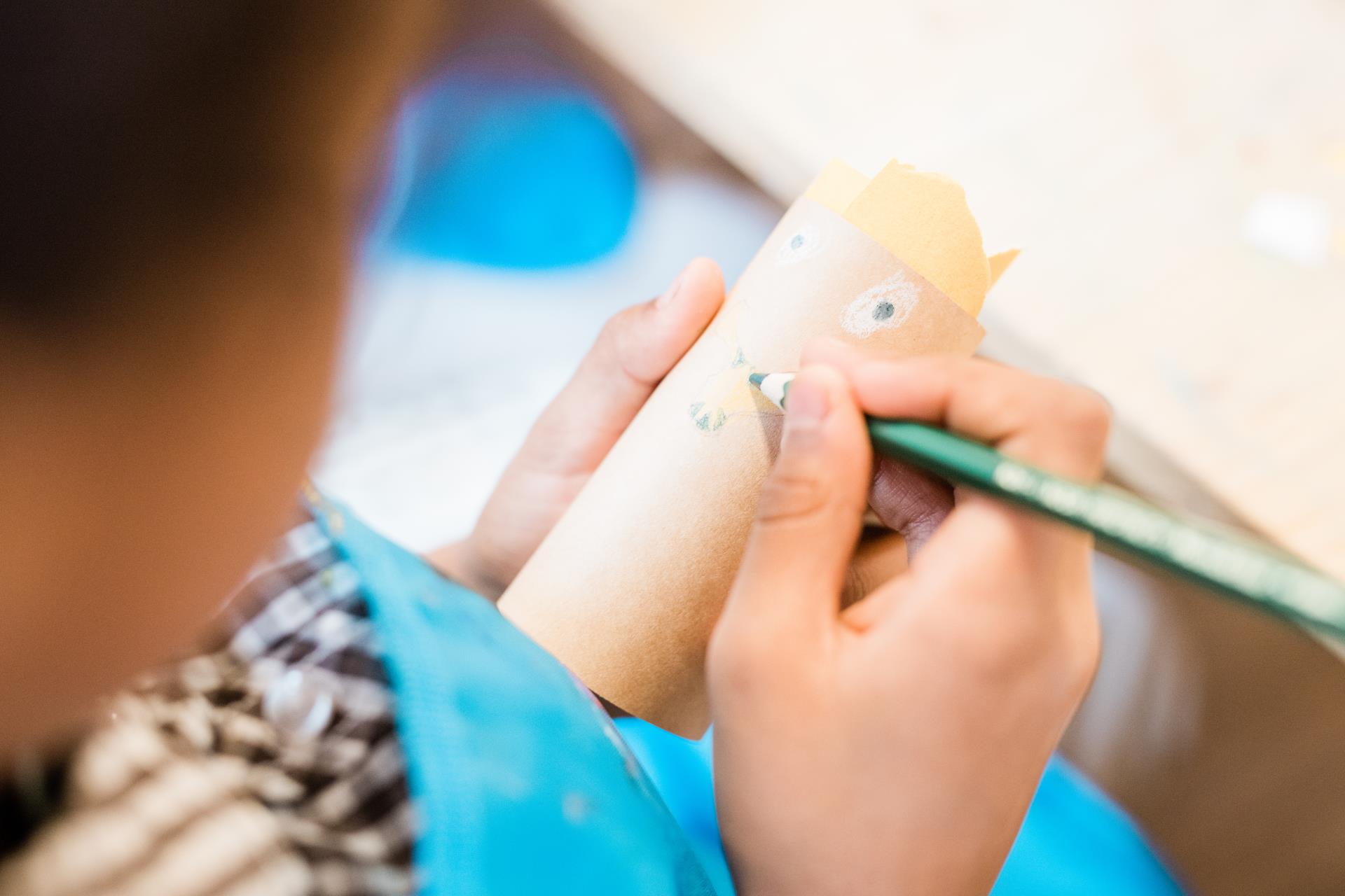 Kids crafting with paper tube