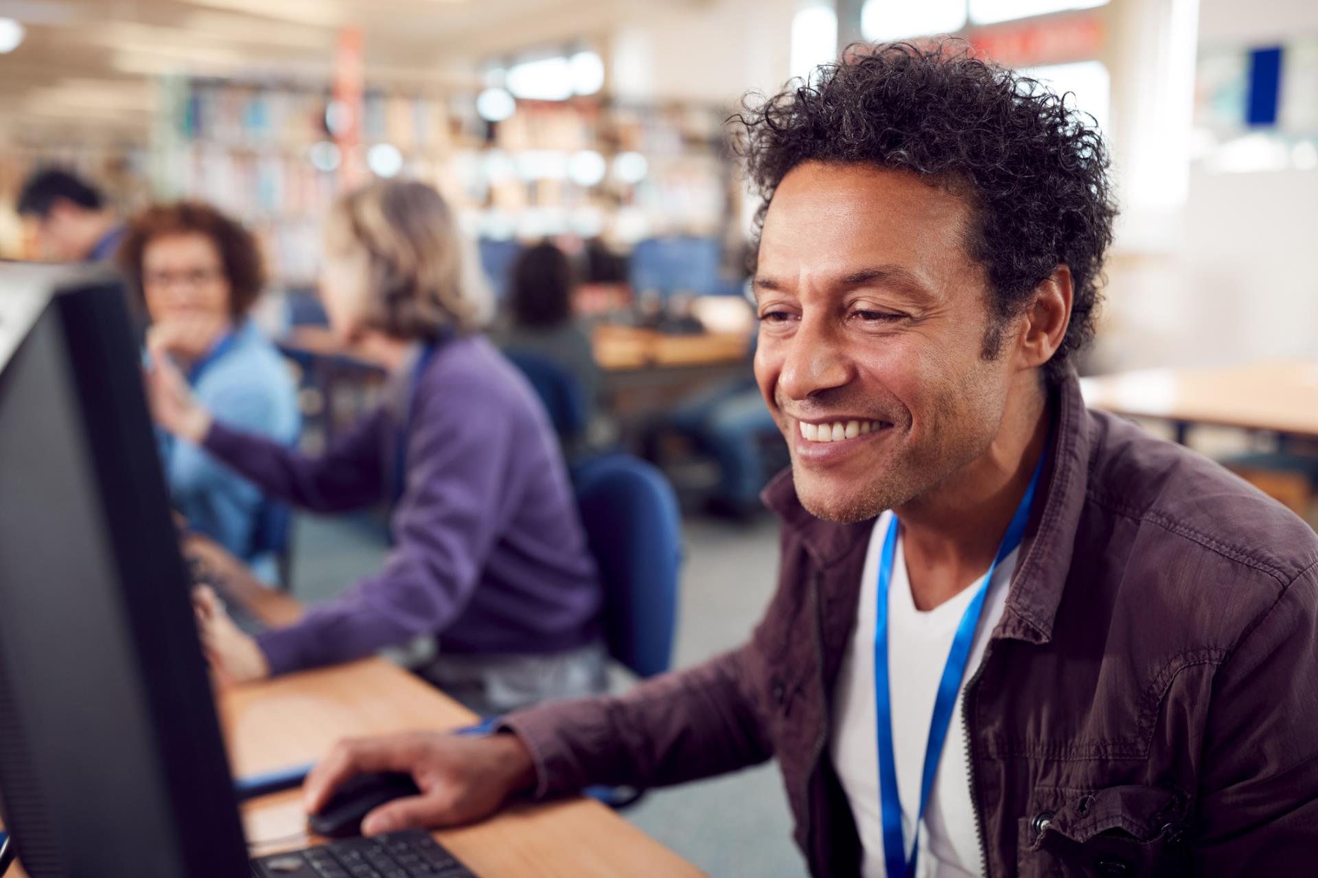 adult man working on computer