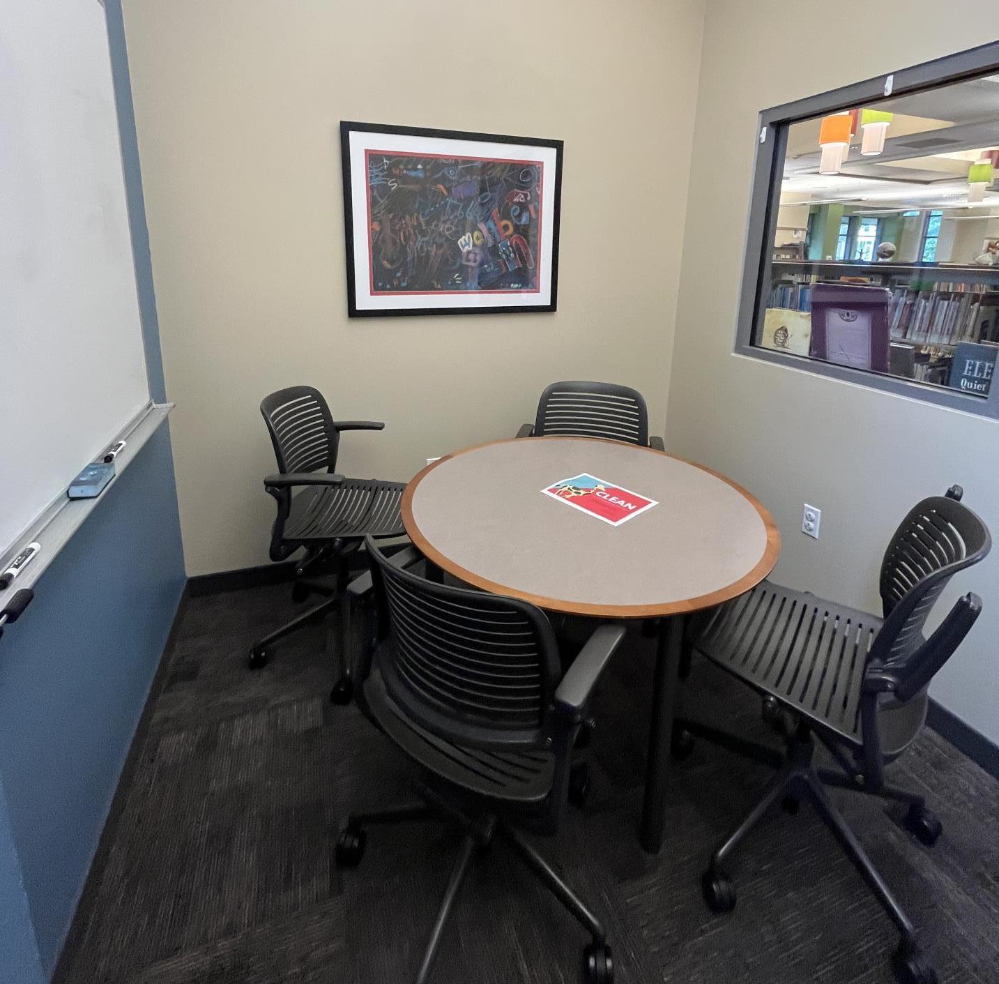 Round table and rolling chairs