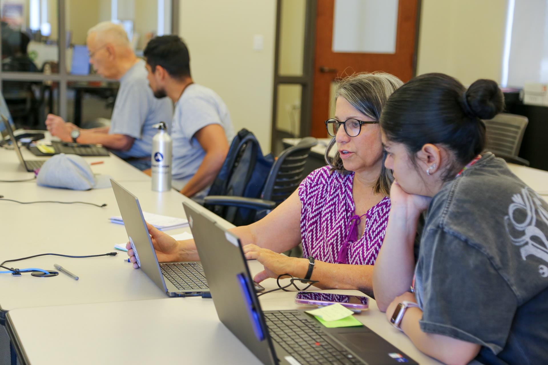 AmeriCorps members working together and planning